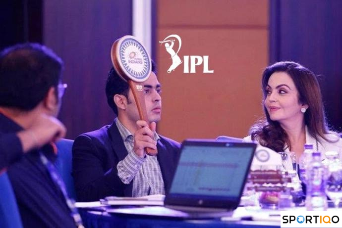 Akash Ambani bidding for a player in the IPL auction.